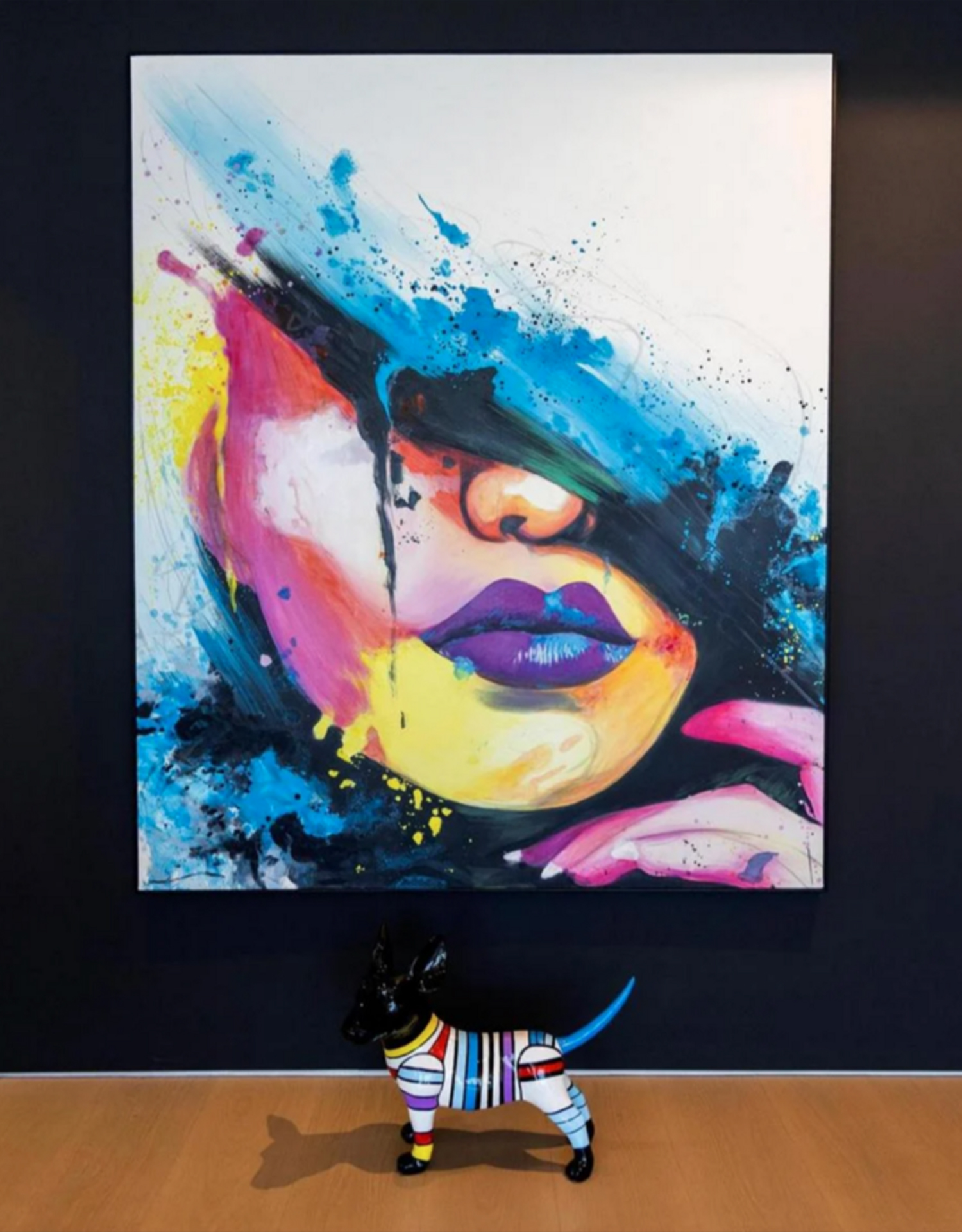 Property Freebies. Gimmick or marketing gold? Wall art of lady's head in vivid colours