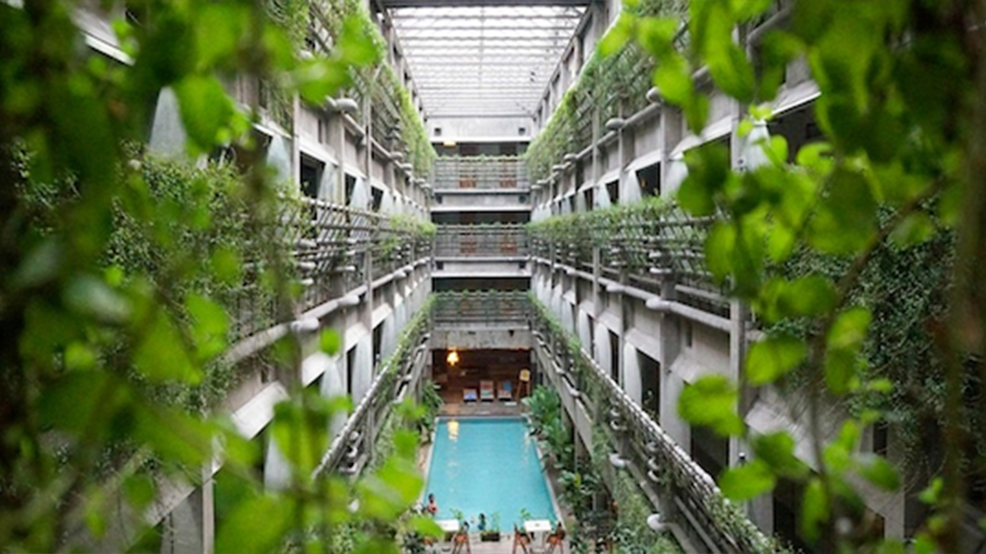 The problem with sustainability | Interior shared space with a pool