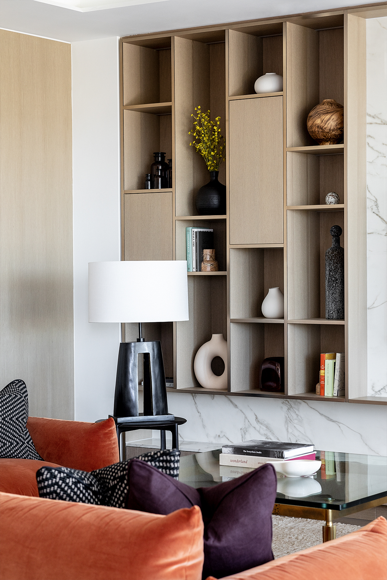 One St. John's Wood | Wooden shelving, velvet sofa and contemporary ornaments | Angel O'Donnell