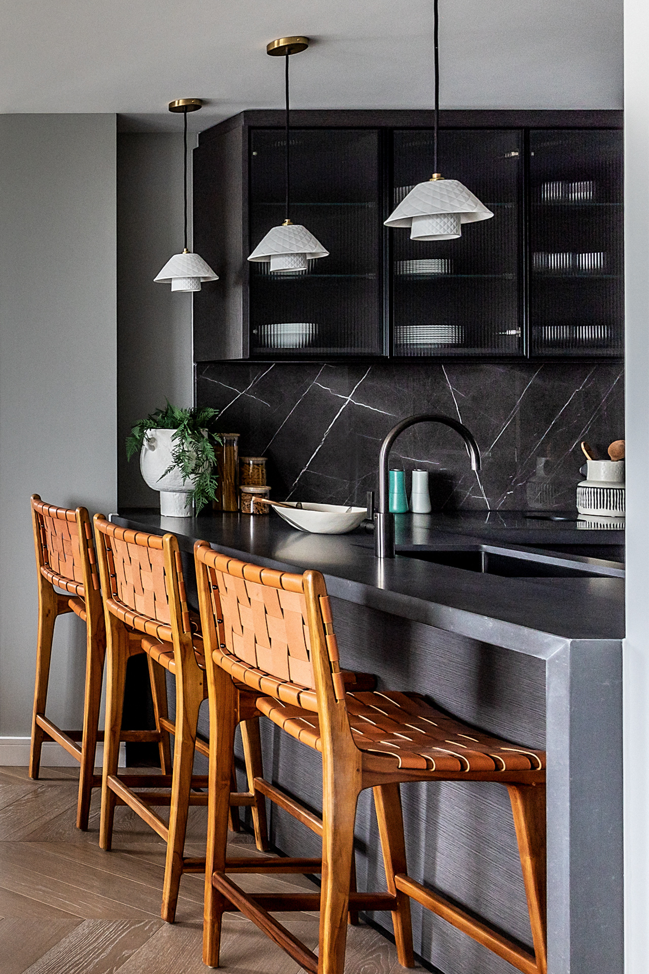 101 on Cleveland | warm soft chairs contrast with graphite greys of the kitchen | Angel O'Donnell
