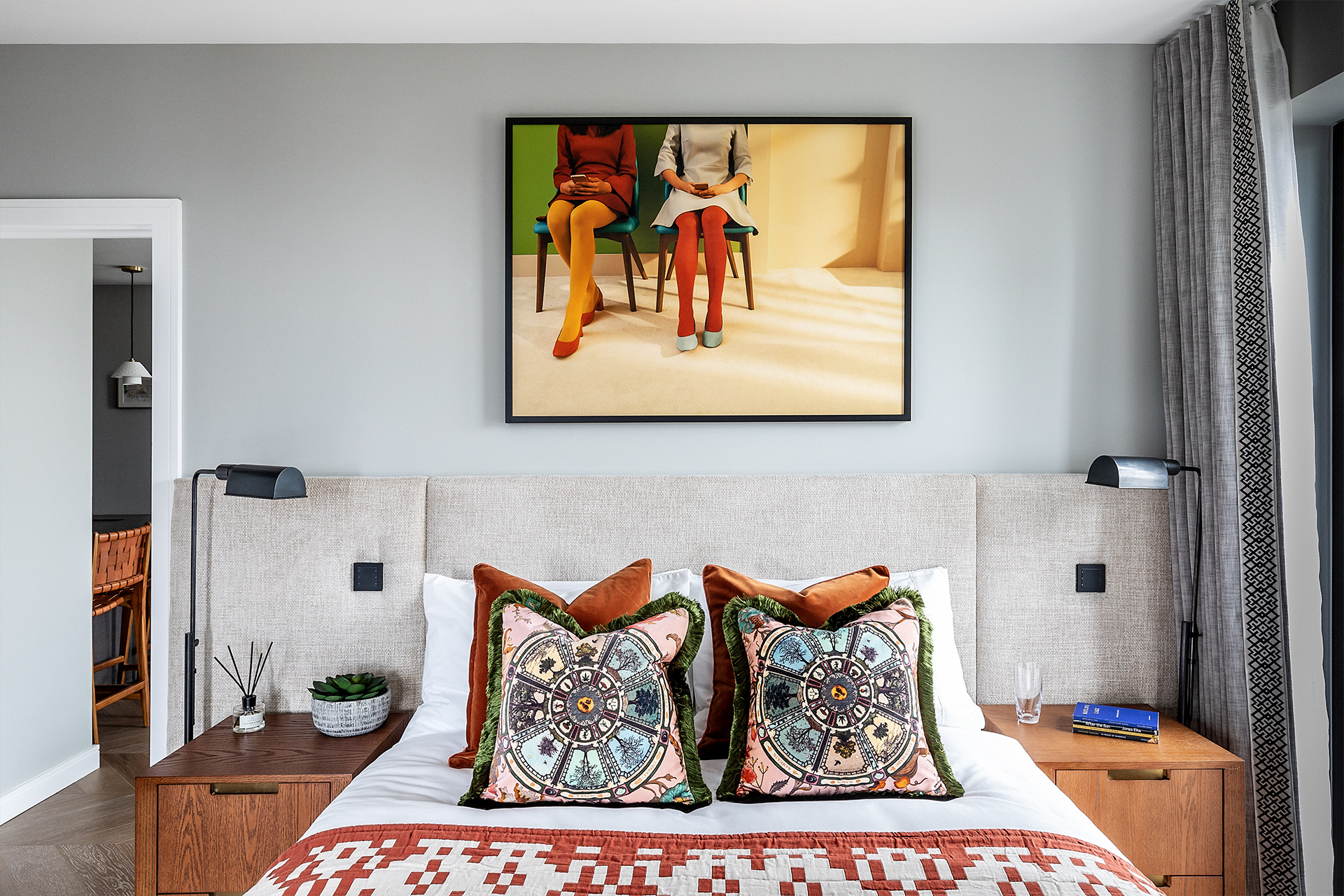 101 on Cleveland | Colourful bedding, cushions and art pop from background | Angel O'Donnell