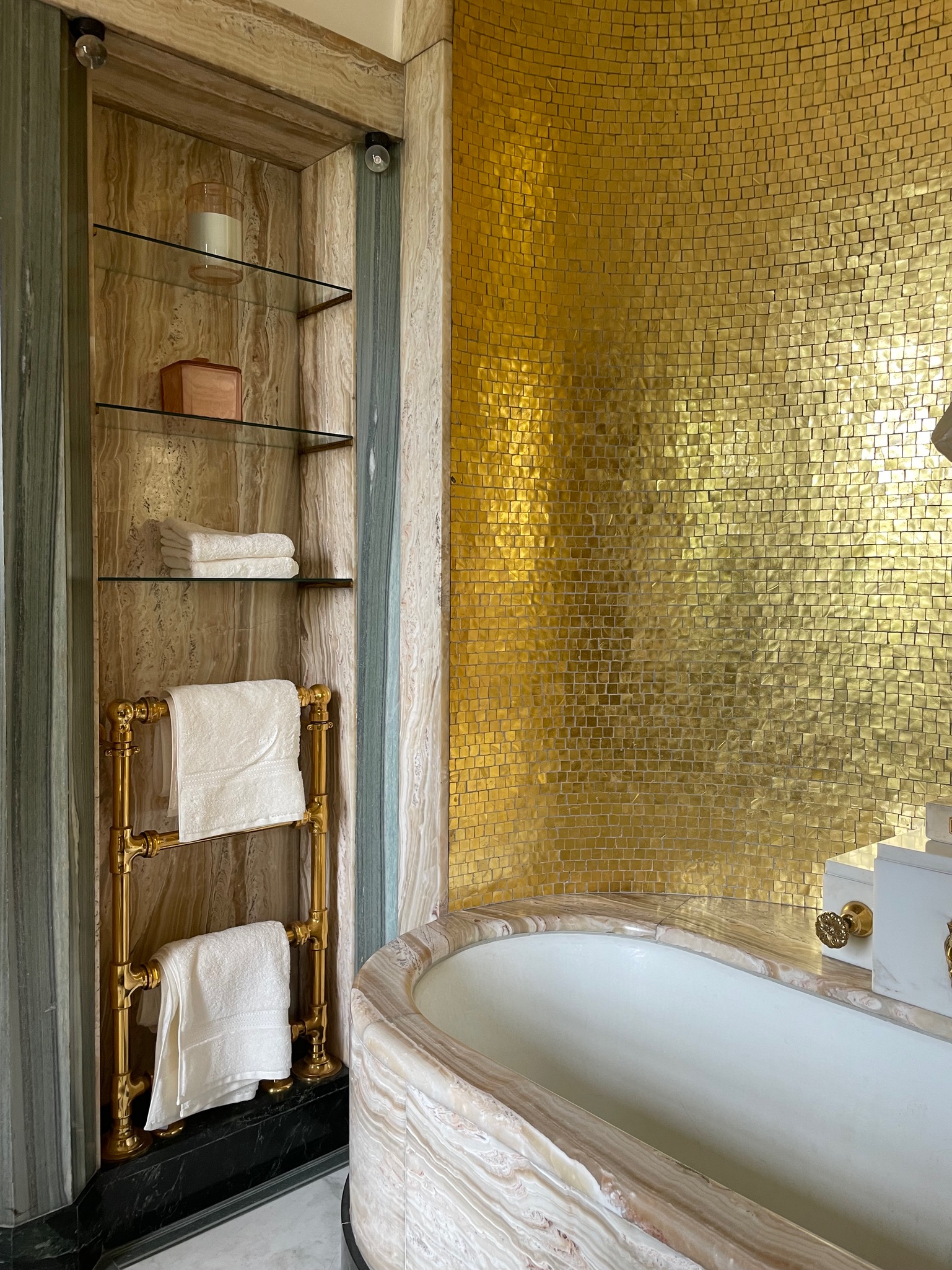 Gold tiled bathroom
