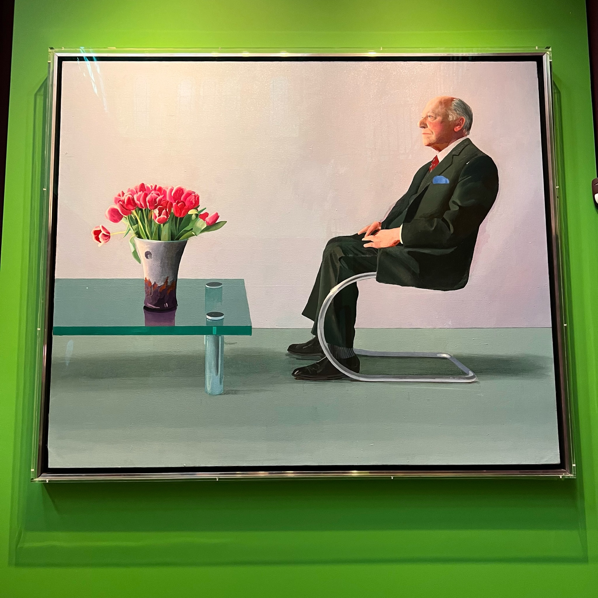 Photo real painting of man in chair