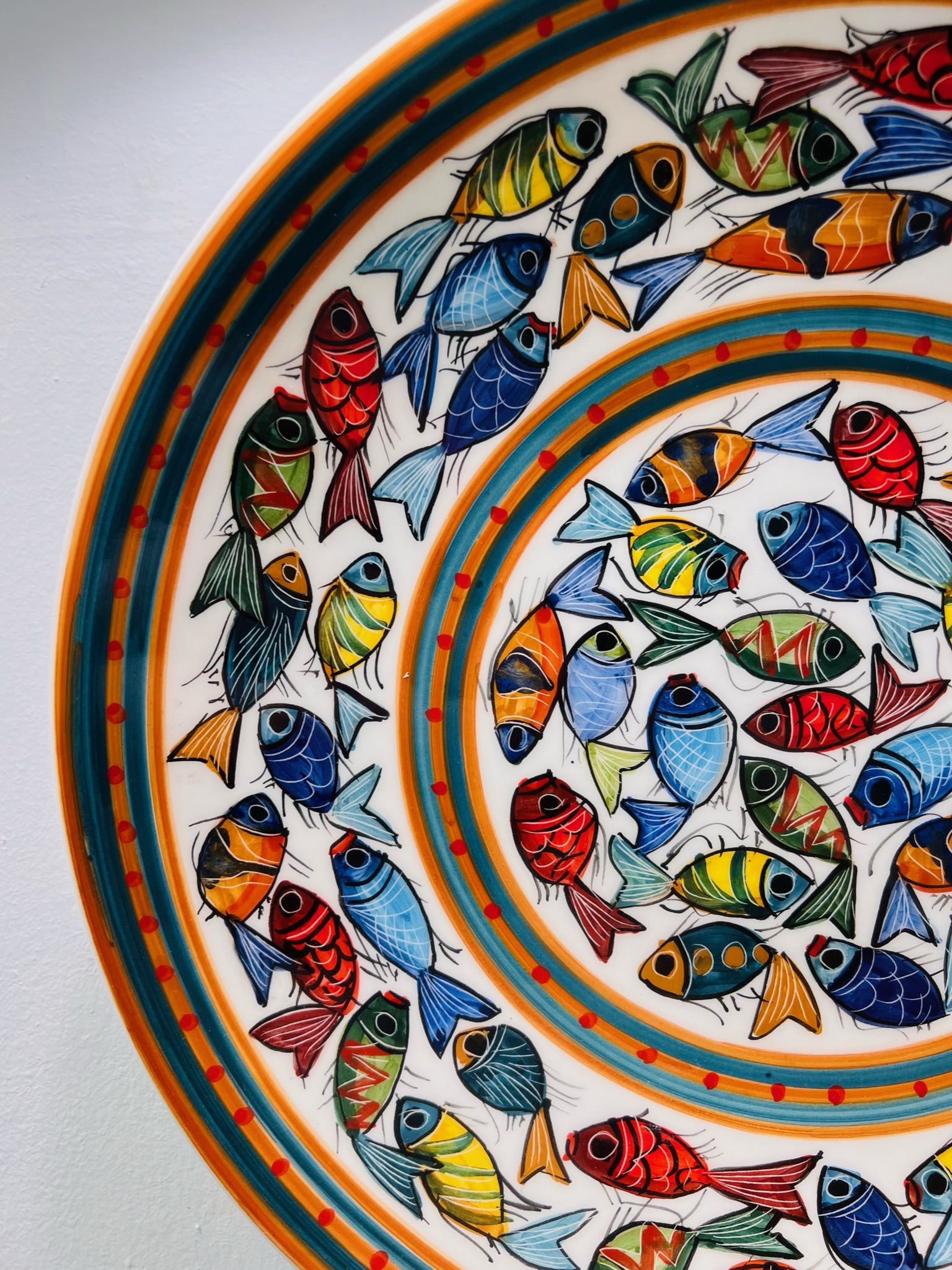 Brightly coloured fish ceramic plate