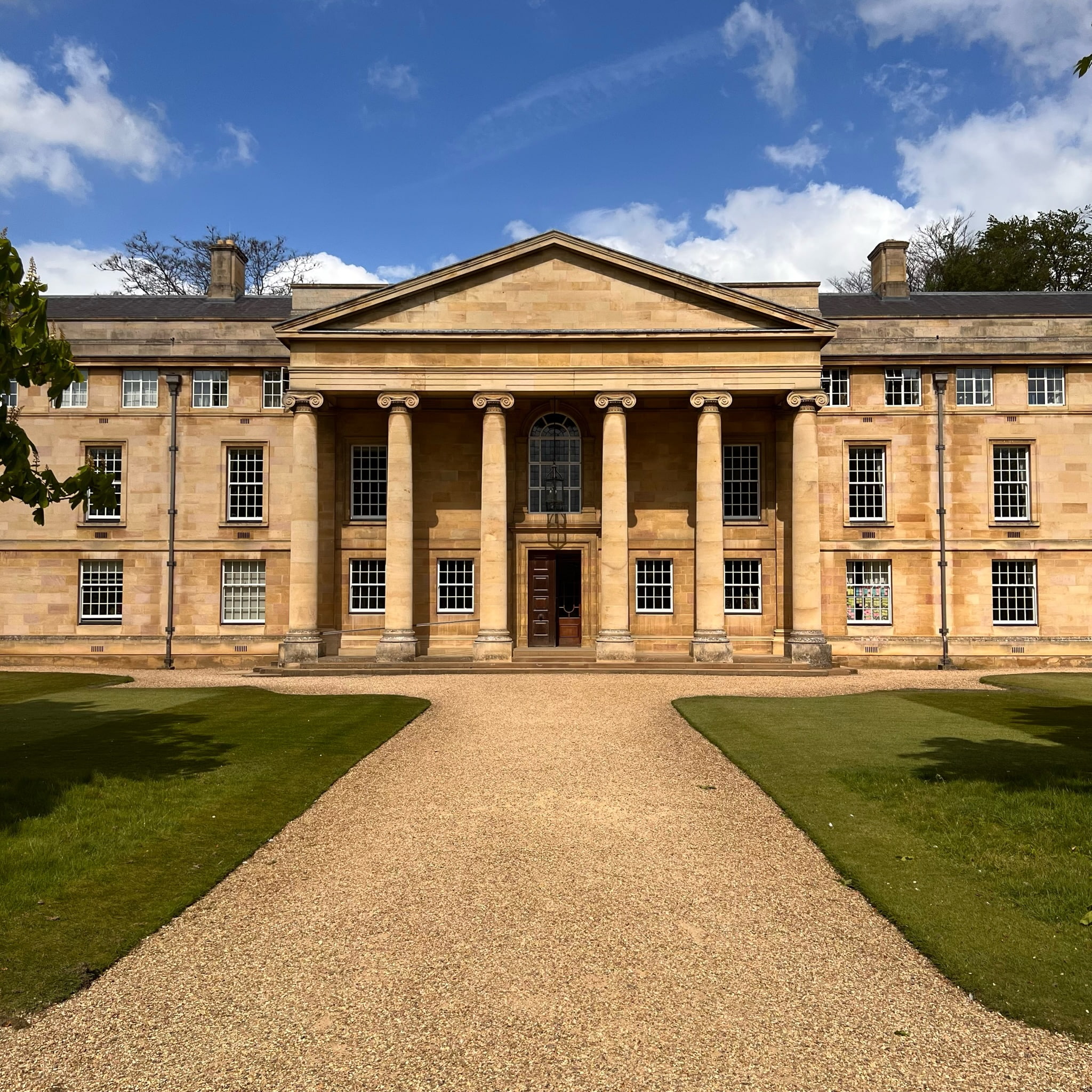 Stately home with ionic pillars