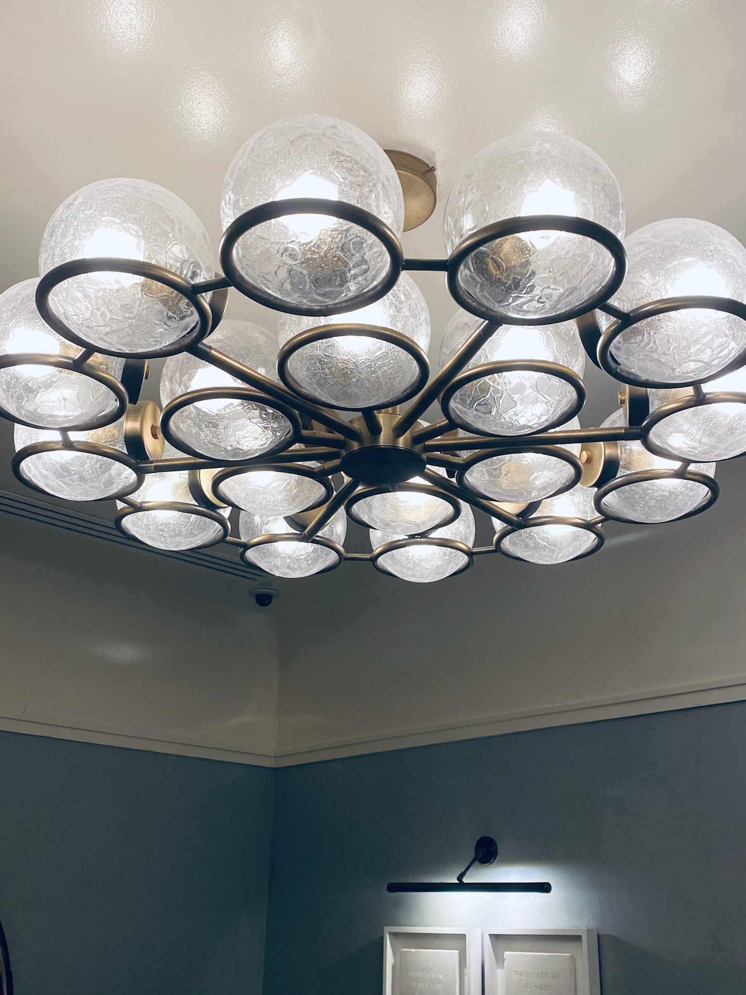 Dramatic ceiling light with glass balls and metal
