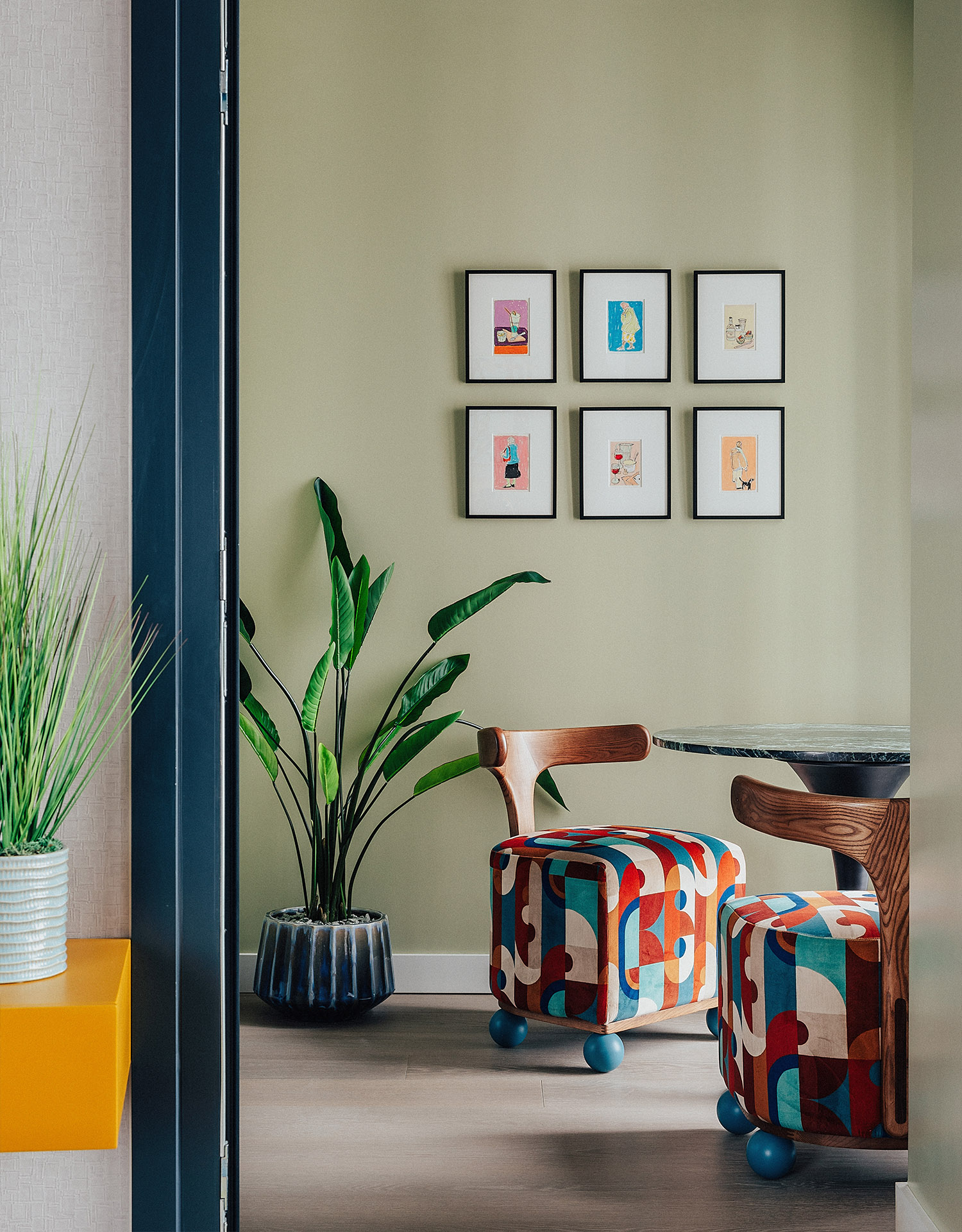 River Park Tower | A breakfast nook with patterned chairs and oil pastel artwork | Angel O'Donnell | Nine Elms